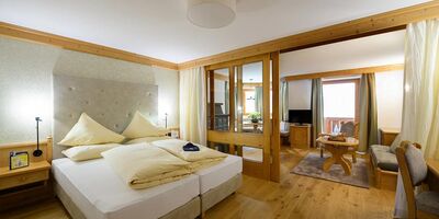 Große Suite mit Schlaf- und Wohnzimmer im Hotel Bergheimat am Hochkönig